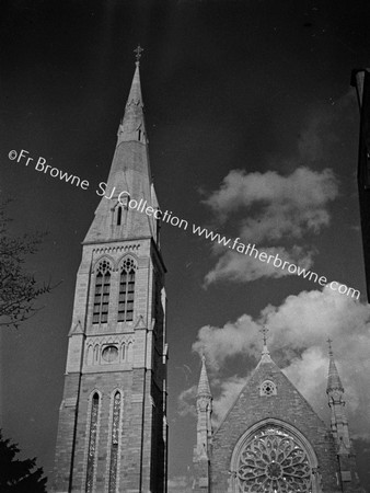 CHURCH SPIRE WITH CLOUDS